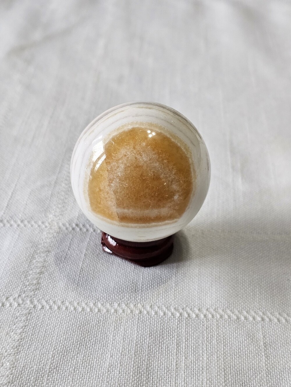 Polished Orange and White Calcite Sphere